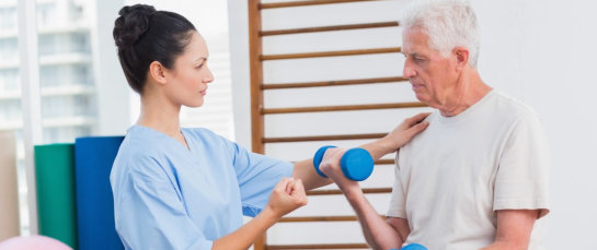 caregiver helping senior man