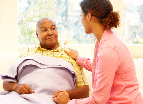 caregiver taking care of a senior man